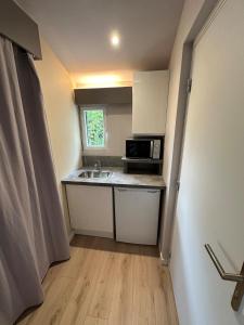 Appartements L-Esquisse Taupe - Parking Clim Netflix Canal : photos des chambres