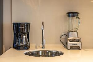 Cosy seaside studio with sunset view