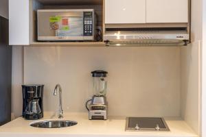 Cosy seaside studio with sunset view