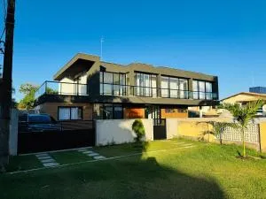 Casa Luxo com 6 suítes, gourmet, piscina e jogos - 卡马萨里