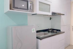 Good Place Studio Apartment M Town Residence near Summarecon Mall By Travelio
