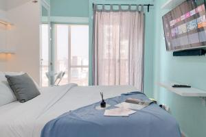 Good Place Studio Apartment M Town Residence near Summarecon Mall By Travelio