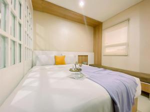 Modern Look 1BR Apartment at Atlanta Residence By Travelio