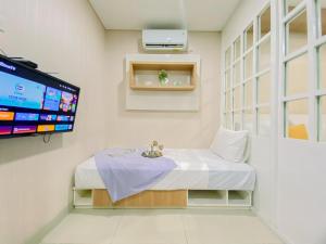 Modern Look 1BR Apartment at Atlanta Residence By Travelio