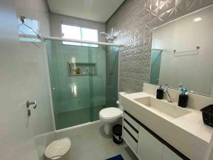 Mansão de luxo em condômino pé na areia