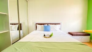 Good and Homey Studio at Belmont Residence Puri Apartment By Travelio