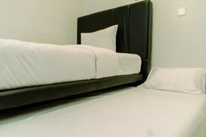 Cozy and Spacious 2BR The Mansion Kemayoran Apartment near JIEXPO By Travelio