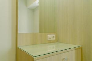 Cozy and Spacious 2BR The Mansion Kemayoran Apartment near JIEXPO By Travelio