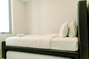 Cozy and Spacious 2BR The Mansion Kemayoran Apartment near JIEXPO By Travelio