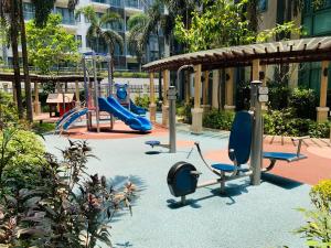Two Palm Tree Villas Condominium - Studio 1O with Balcony - Across Terminal 3 Airport