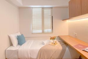 Well Designed 2BR Meikarta Apartment By Travelio