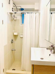 Free Car Parking - Sheridan North 1BR Apt near BGC