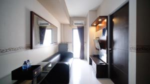 Best Price and Homey 1BR at Tamansari Prospero Sidoarjo Apartment By Travelio