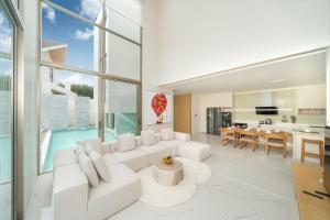 Exclusive Living in Designer 4BR Pool Villa in Lux Pride 2 V11 Residence, Near Laguna