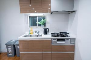 Japanese style single-family house, three floors, 75 square meters, three bedrooms and one living room