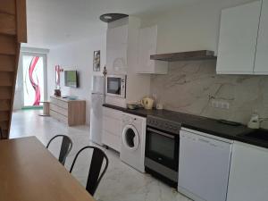 Appartements Auxpetitsloups : photos des chambres