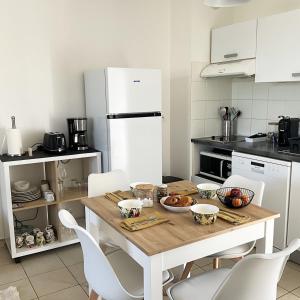 Appartements Appartement cosy avec wifi en bord de mer : photos des chambres