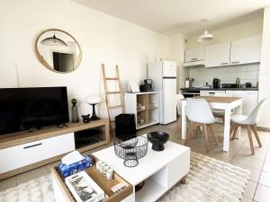 Appartements Appartement cosy avec wifi en bord de mer : photos des chambres