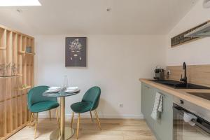 Appartements La Savane, Studio Calme & Hyper Centre Villefranche-sur-Saone : photos des chambres