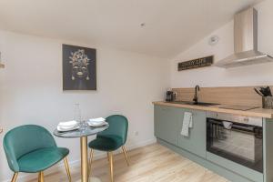 Appartements La Savane, Studio Calme & Hyper Centre Villefranche-sur-Saone : photos des chambres