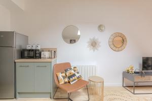 Appartements La Savane, Studio Calme & Hyper Centre Villefranche-sur-Saone : photos des chambres