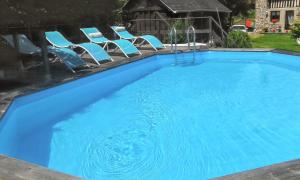 Maisons de vacances Maison charmante a Notre-Dame-du-Touchet avec piscine partagee : photos des chambres