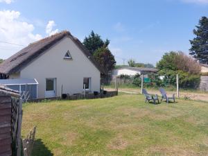 Maisons de vacances Acces direct mer. Plage du Debarquement : photos des chambres