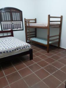 Linda casa com piscina a 100 metros da praia