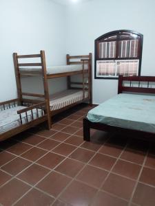 Linda casa com piscina a 100 metros da praia