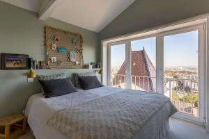 Maisons de vacances Hamac Suites - L-Epoustouflante : photos des chambres