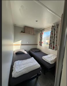 Campings Grand MobilHome 6 Places Climatise : photos des chambres