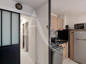 Beau T2 moderne, residence avec piscine - Place de parking