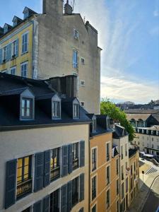 Appartements Coeur Historique - CosyHome 18 - Parking a proximite : photos des chambres