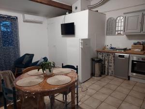 Appartements L'esquirou : photos des chambres