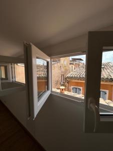 Appartements Charmant appart climatise avec vue sur les toits : photos des chambres