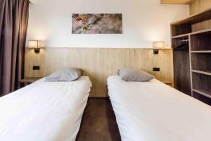 Hotels Village Vacances ATC Routes du Monde 3 Etoiles Saint-Francois-Longchamp : photos des chambres