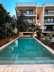 Artistic Loft Steps from the Beach with Pool View