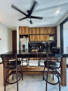 Artistic Loft Steps from the Beach with Pool View