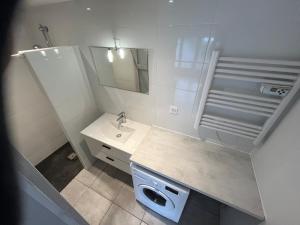 Appartements La Loge de Gustave et son patio avec Wifi et parking privee : photos des chambres