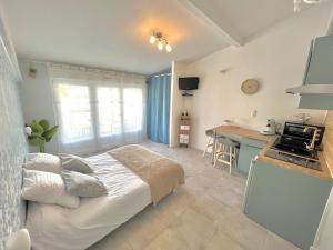 Appartements La Loge de Gustave et son patio avec Wifi et parking privee : photos des chambres