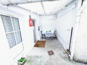 Sejours chez l'habitant Chambres Poitiers Centre Ville - Salle de Bain, Refrigerateur, TV et machine a cafe privatifs - Cuisine commune - Terrasse - Hotel de ville a 200m : photos des chambres
