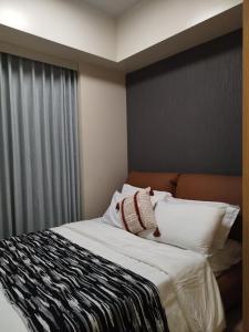 Savvy Suites Combined 5BR near Okada