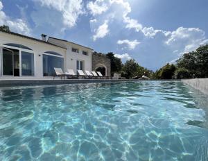 Villas Maison de Maitre Albitru - Piscine - Vue Golfe St-Florent : photos des chambres