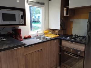 Campings MOBIL-HOME TOUT CONFORT, 3 CHAMBRES, Domaine de Kerlann : photos des chambres