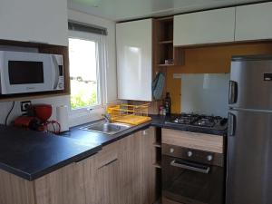 Campings MOBIL-HOME TOUT CONFORT, 3 CHAMBRES, Domaine de Kerlann : photos des chambres