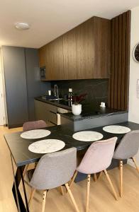 NEW apartment with free garage parking near the airport