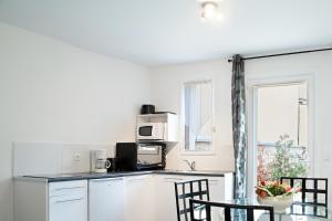 Appartements Appartement Avec Terrasse : Appartement - Rez-de-Chaussée