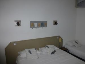 Hotels Hotel La Licorne : photos des chambres