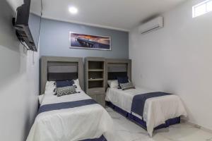 Suite de 2 recamaras con balcón en Centro 301