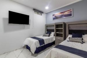 Suite de 2 recamaras con balcón en Centro 301